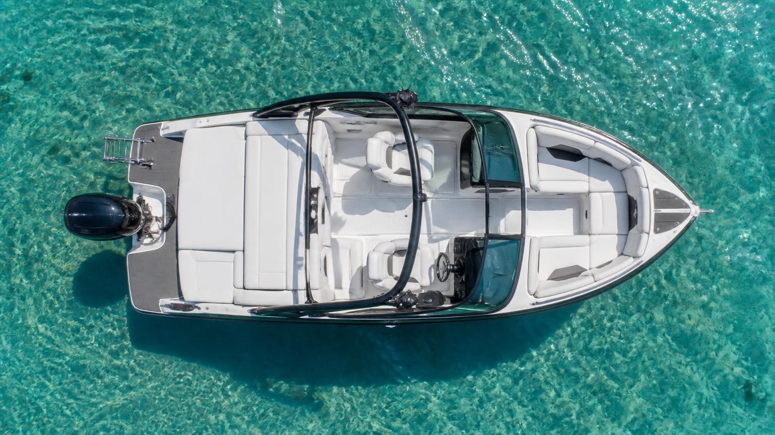 Axopar 29 Sun Top Bowrider Amazing Photo by www.BOWRIDER-BOATS.com — Axopar 29 Sun Top bowrider boat, on the water, 29.0 ft fibreglass hull with outboard propulsion. Images Created by www.Bowrider-Boats.com